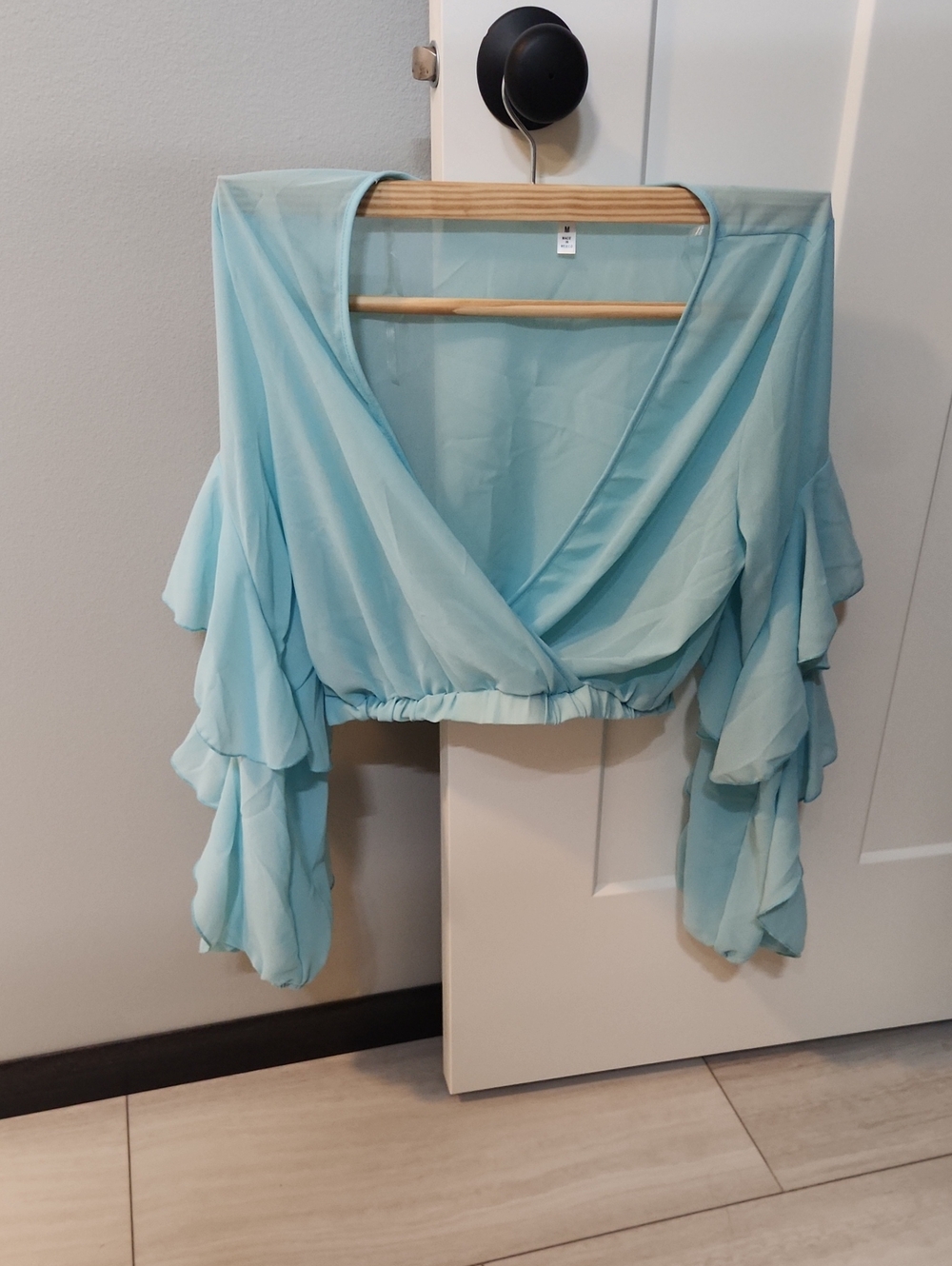 Fashion Nova Light Blue Ruffle Sleeve Cropped Wrap Blouse